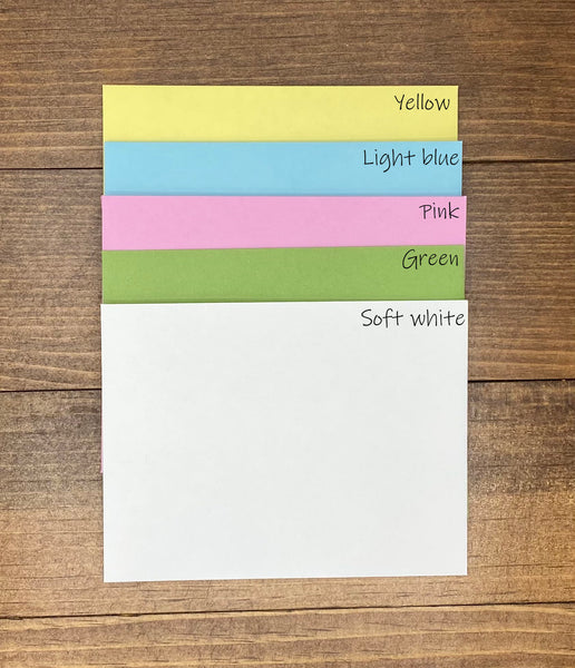 The five envelope colors shown are yellow, light blue, pink, green and soft white.