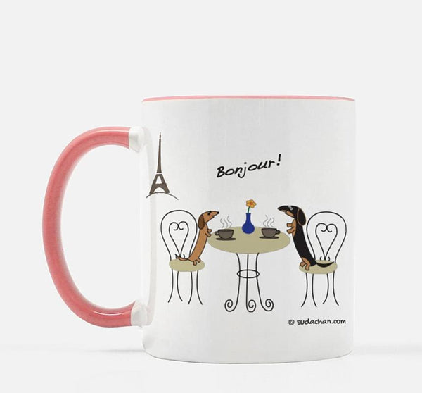 two dachshunds in paris cafe eiffel tower on pink and white mug 