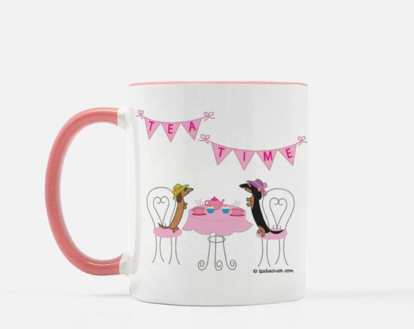 Two dachshunds wearing Easter hats enjoying a tea party on 11 oz. pink ceramic mug.