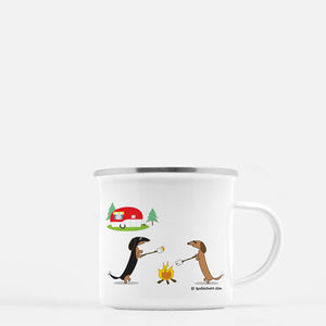 Two dachshunds roasting marshmallows by a campfire with RV camp mug.