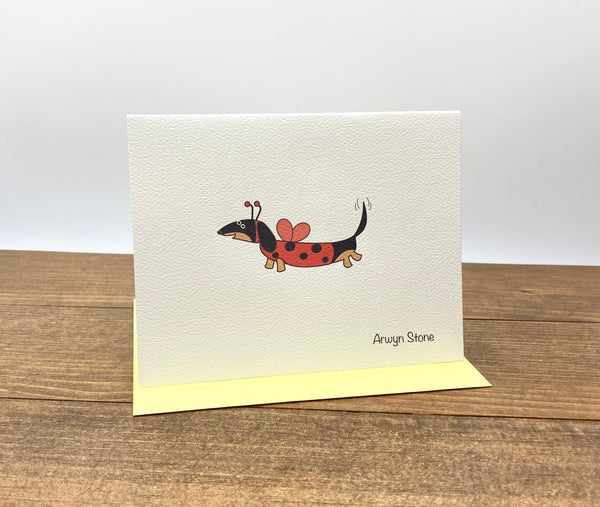 Black and tan dachshund dressed as ladybug personalized note card.