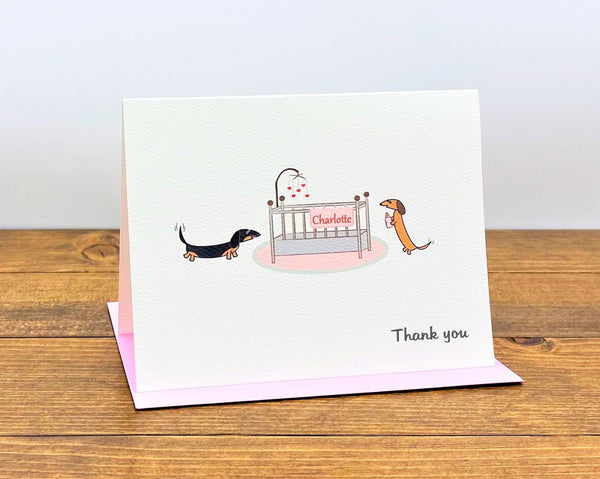 Two dachshunds with crib unique baby note cards.