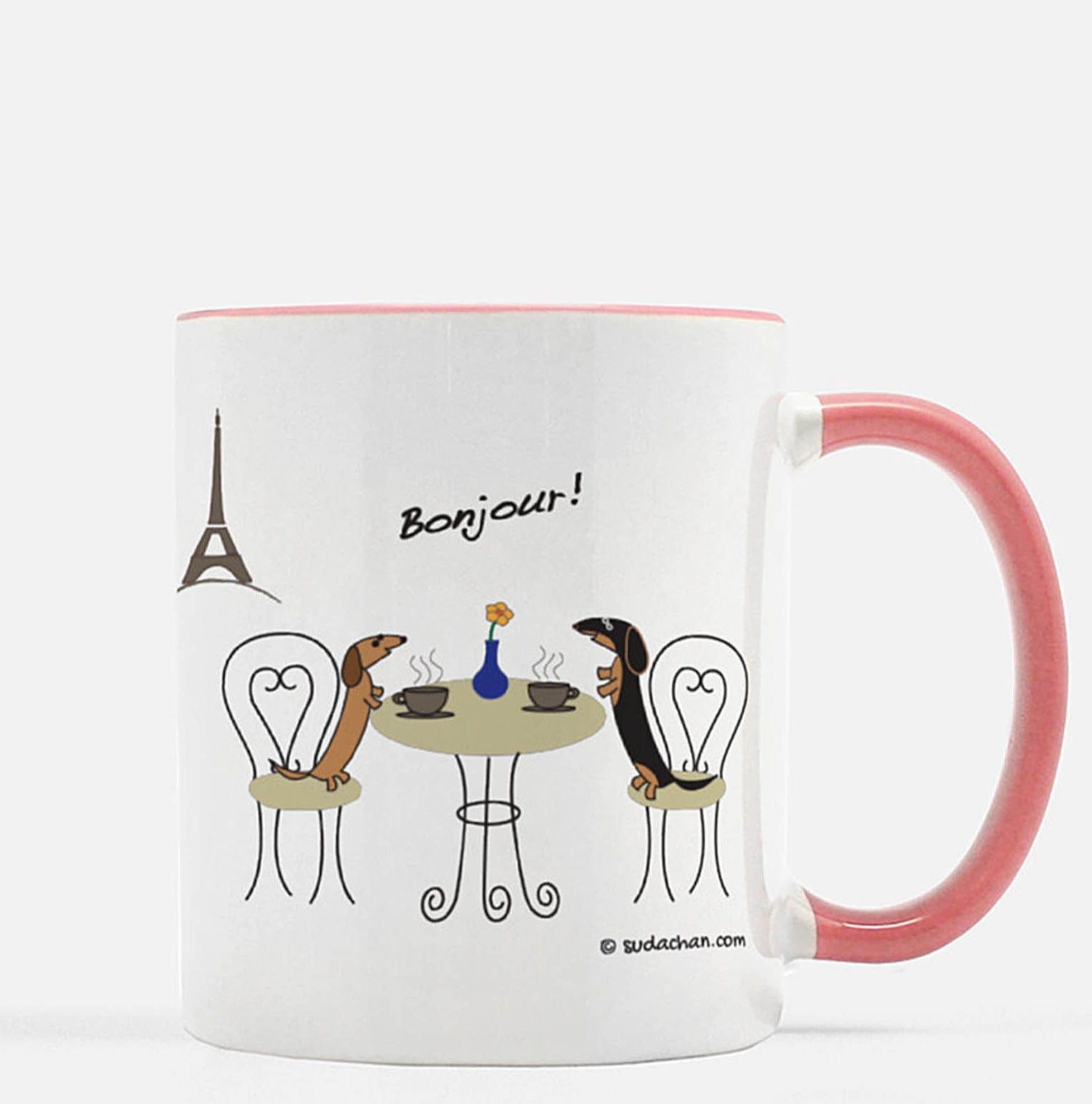 Two dachshunds in paris cafe pink and white ceramic mug.