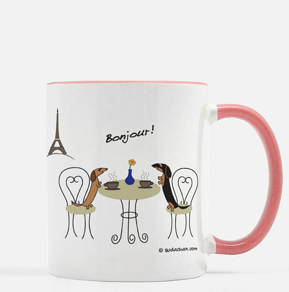 Two dachshunds in paris cafe pink and white ceramic mug.