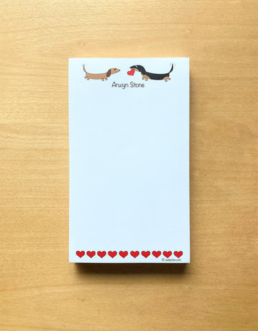 Two dachshunds with hearts personalized notepad.