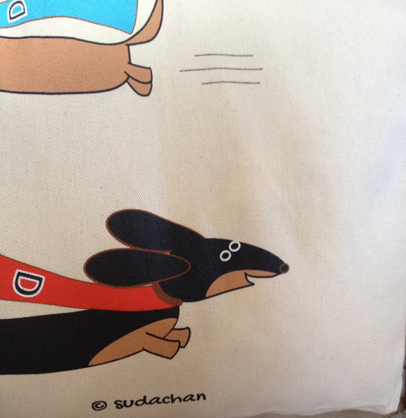 Closeup of screen printed super dachshunds tote bag.